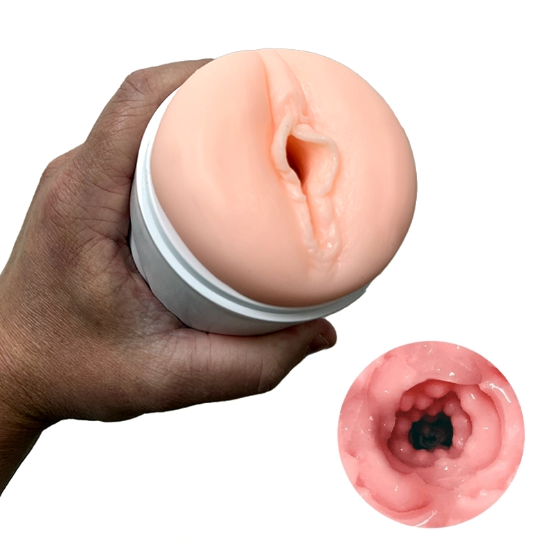 Close-up view of The Vortex stroker's realistic internal texture and soft sleeve opening - Alpha Lover