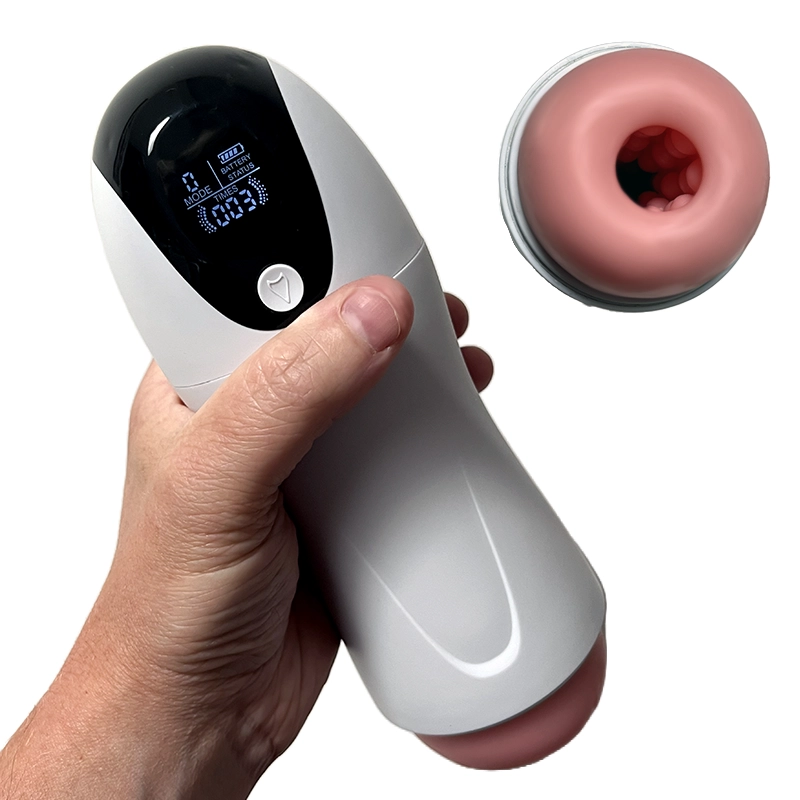 The Rep automatic masturbator with its clear LCD screen held in hand to show ergonomic grip and scale - Alpha Lover