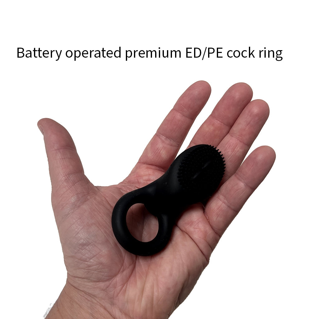 The Trigger, a premium battery-operated cock ring for ED and PE, held in hand - Alpha Lover